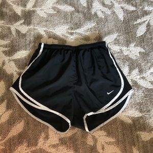 Black Nike running shorts